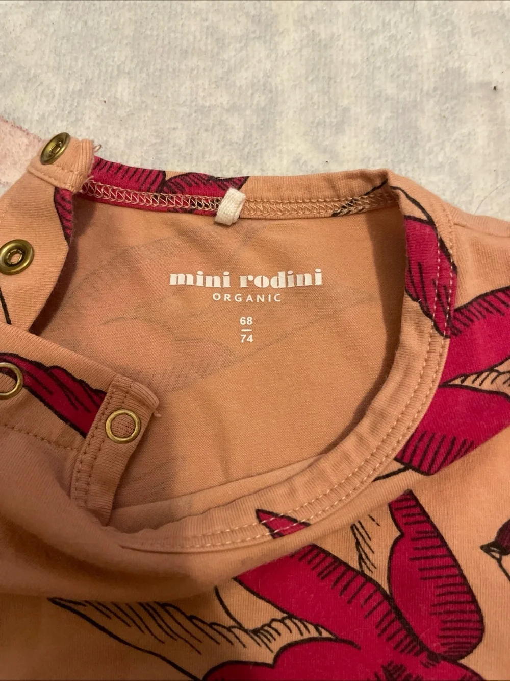 Mini Rodini Peach Bodysuit with Red Bird Print